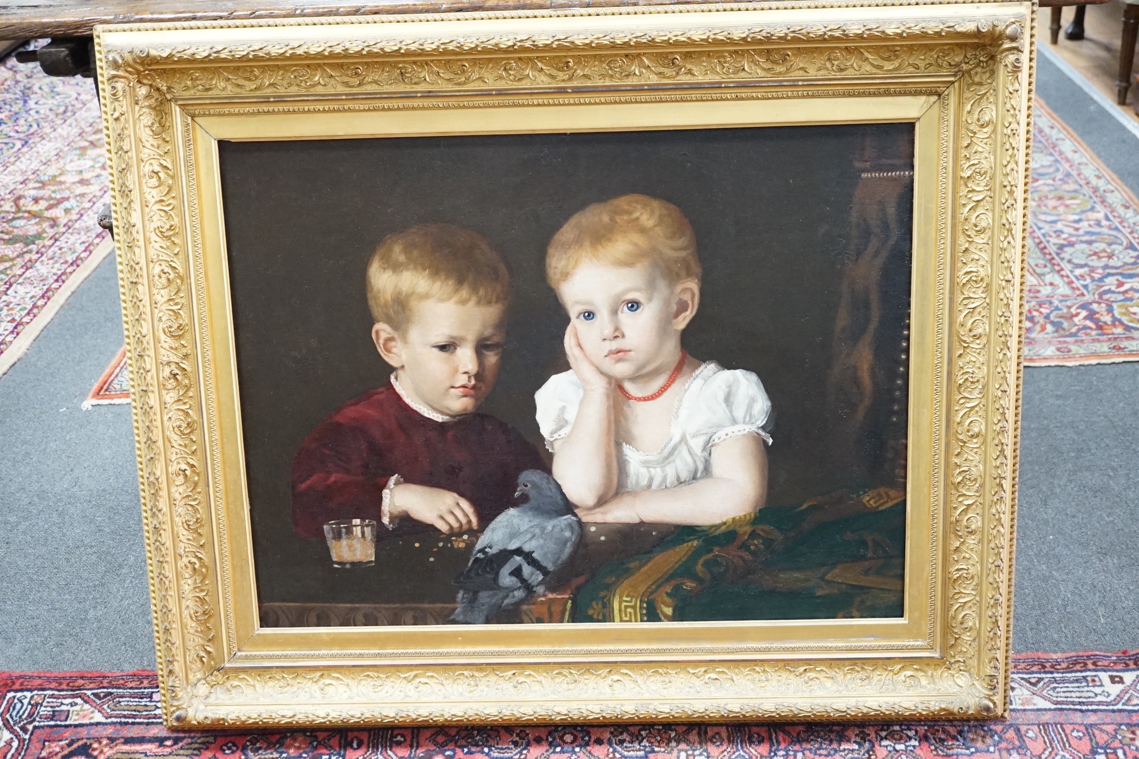 James Sant R.A. (1820-1916), oil on canvas, Portrait of two boys with a pet pigeon, 54 x 73cm